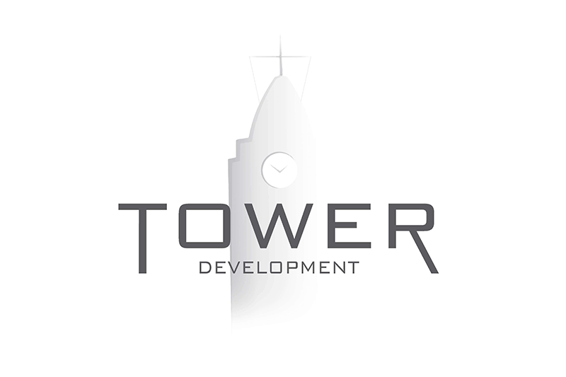 "Tower Development" text over tower with clock in background
